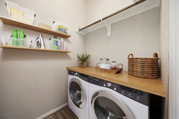 a utility room with dryer and washer