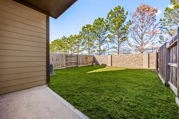 a view of a backyard with a garden