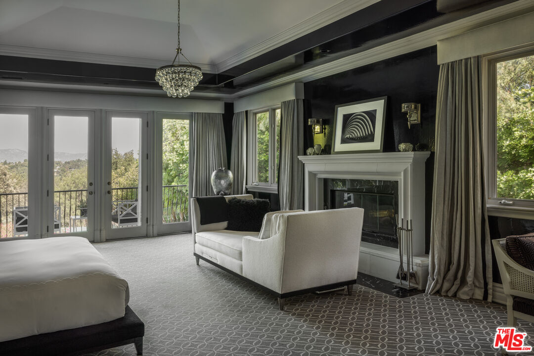 11972 Lockridge Road Studio City, CA 91604 - Photo 17 of 29 a living room with furniture and a large window