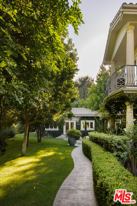 11972 Lockridge Road Studio City, CA 91604 - Photo 25 of 29 a front view of a house with a yard