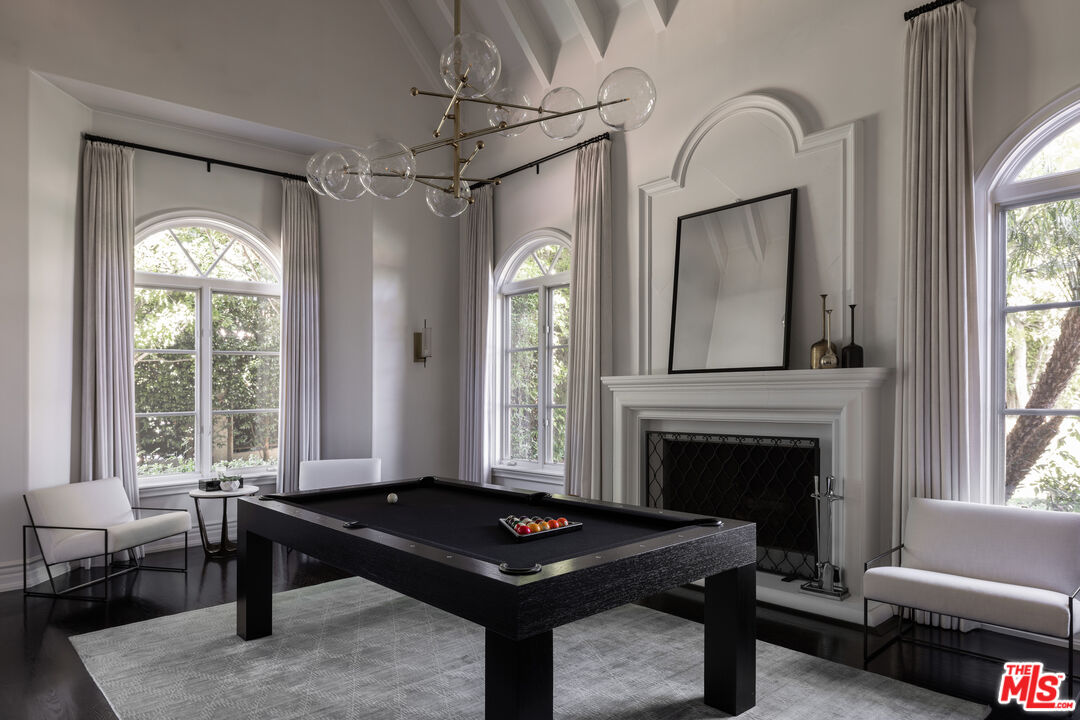 11972 Lockridge Road Studio City, CA 91604 - Photo 6 of 29 a living room with furniture and a fireplace