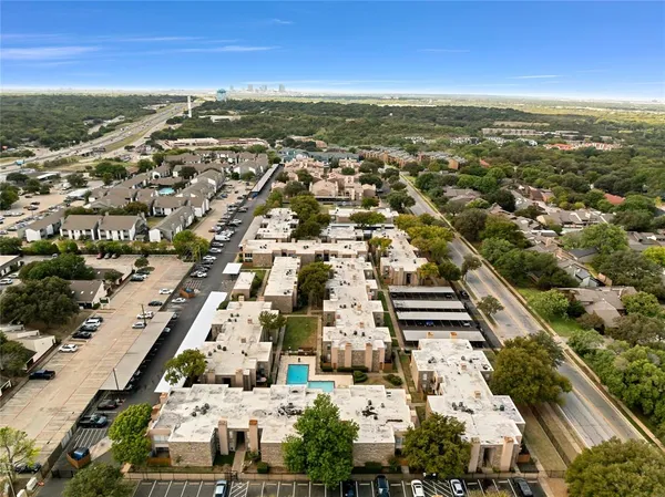 a utility room with sink dryer and washer