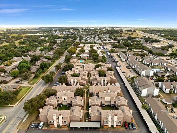 a kitchen with a stove a sink and a refrigerator