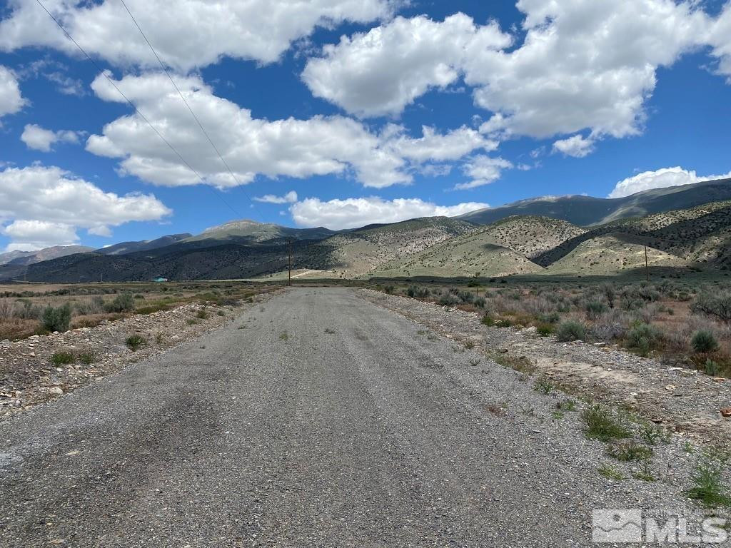 12860 Reno Drive Lovelock, NV 89419 - Photo 3 of 6 a view of a dry yard with wooden fence