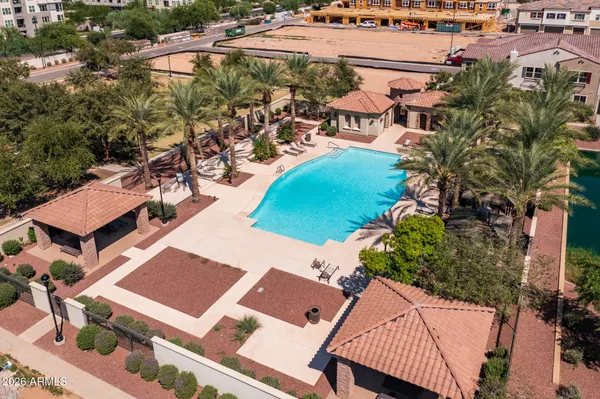 a view of a swimming pool with a patio