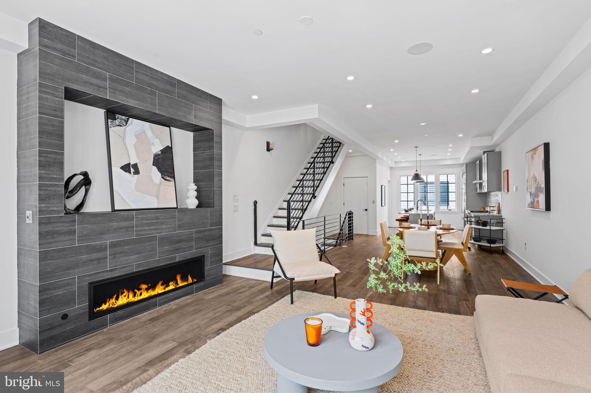 742 South Broad Street Philadelphia, PA 19146 - Photo 12 of 41 a living room with furniture and a fireplace