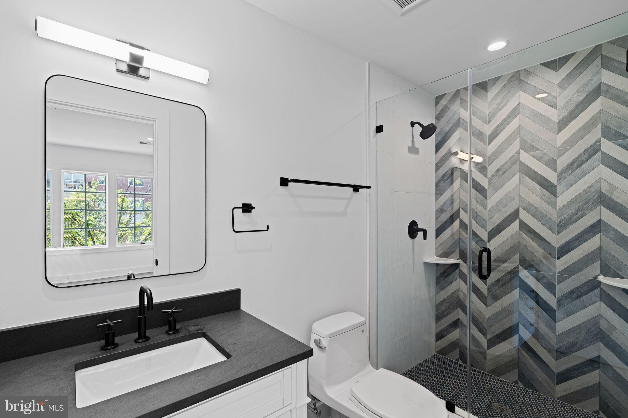 742 South Broad Street Philadelphia, PA 19146 - Photo 24 of 41 a bathroom with a sink toilet and shower