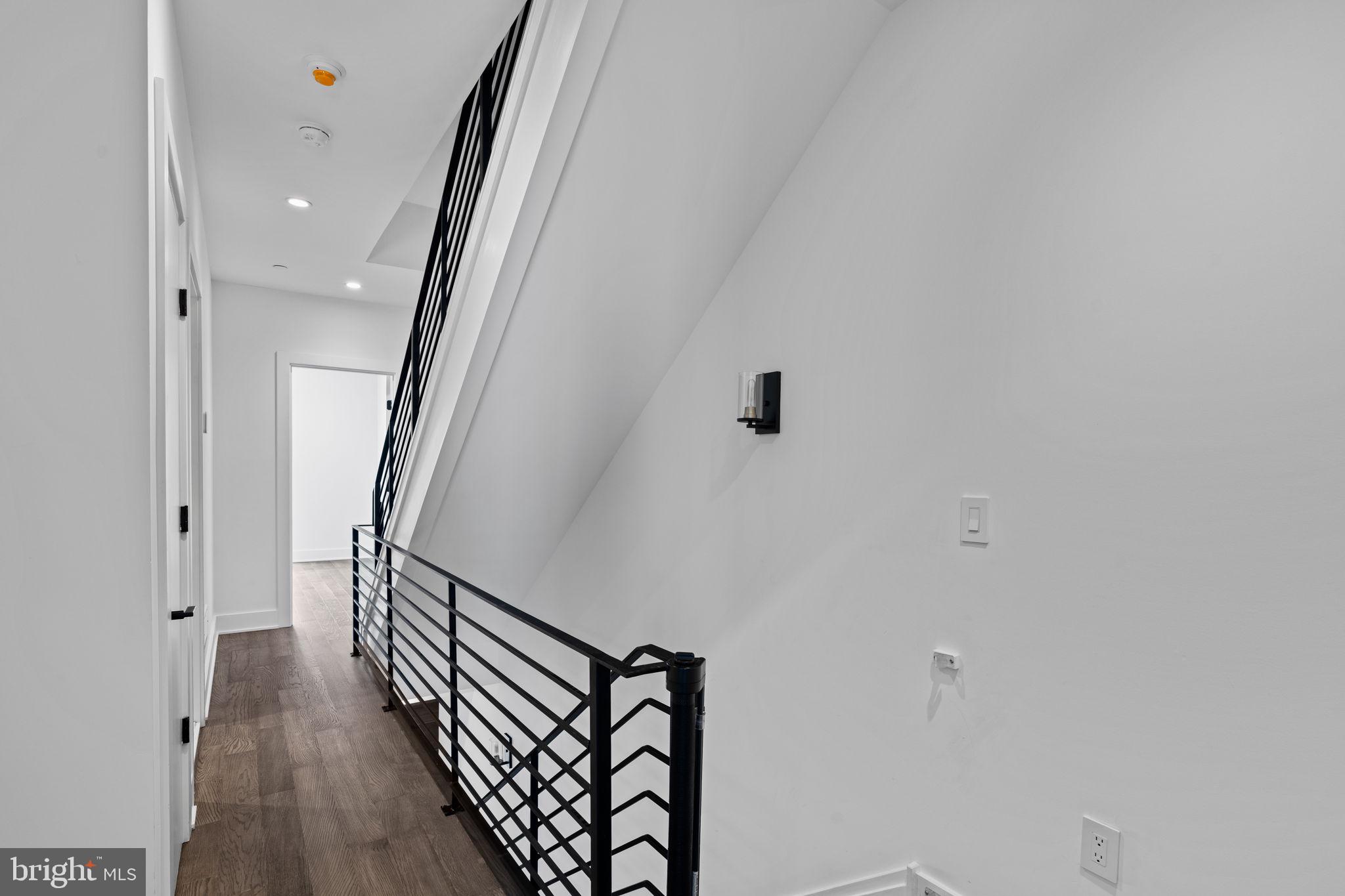742 South Broad Street Philadelphia, PA 19146 - Photo 29 of 41 a view of a hallway with wooden floor
