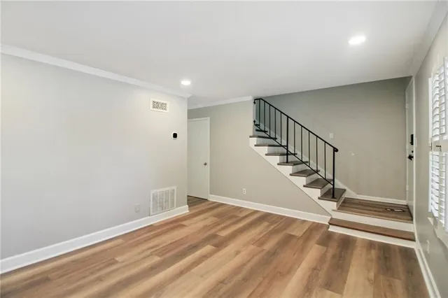a view of entryway with wooden floor