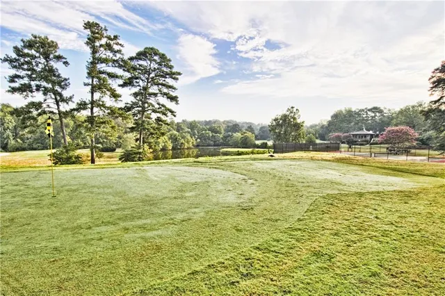 a view of a swimming pool with an ocean view
