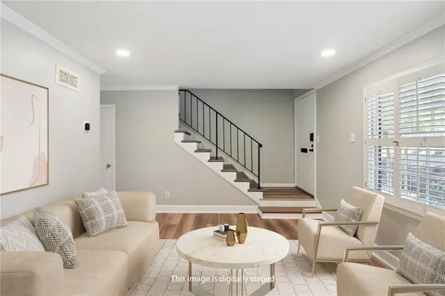 a living room with furniture and a table