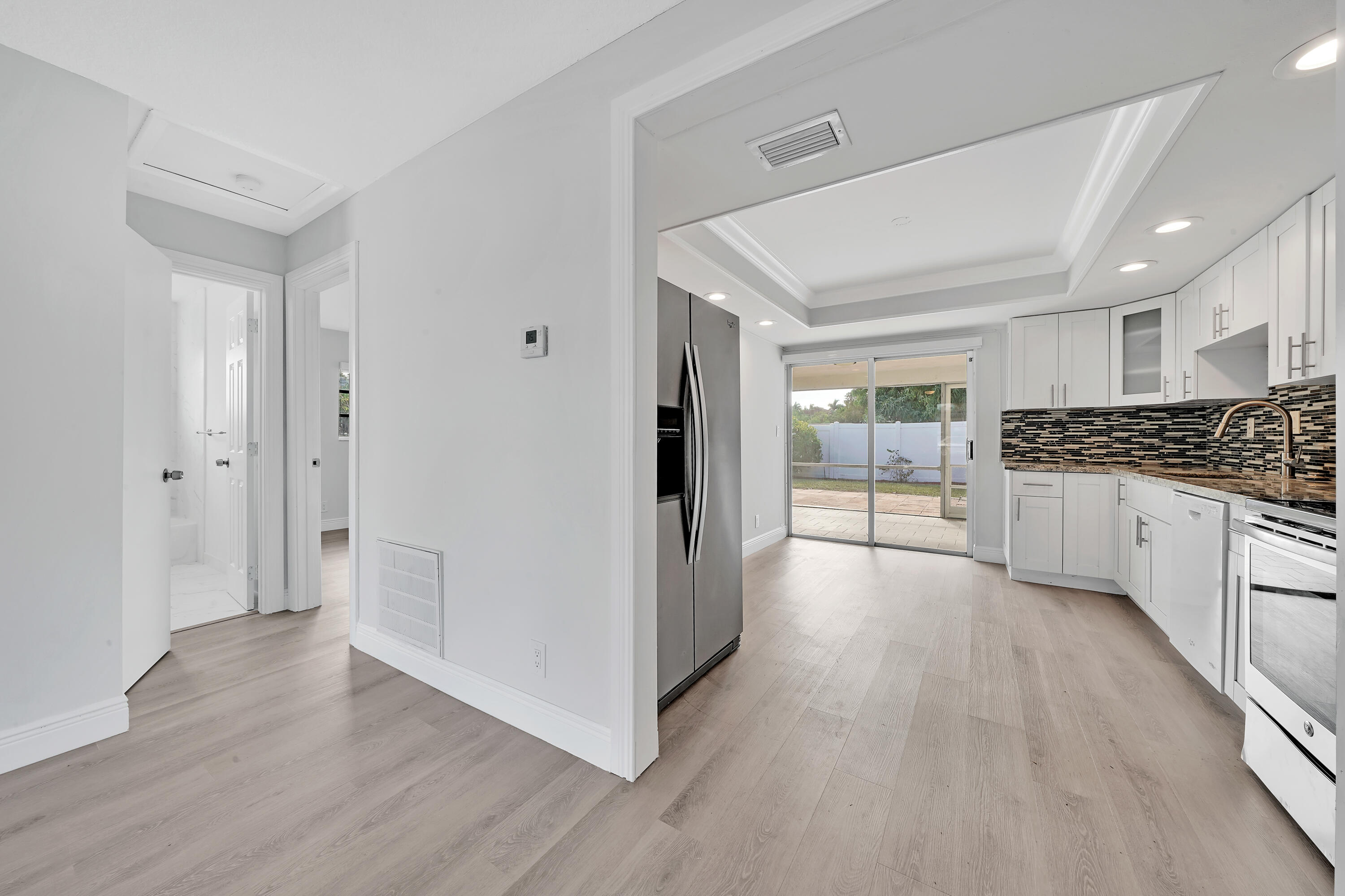 104 Palamino Circle Boca Raton, FL 33487 - Photo 10 of 34 a view of kitchen with wooden floor