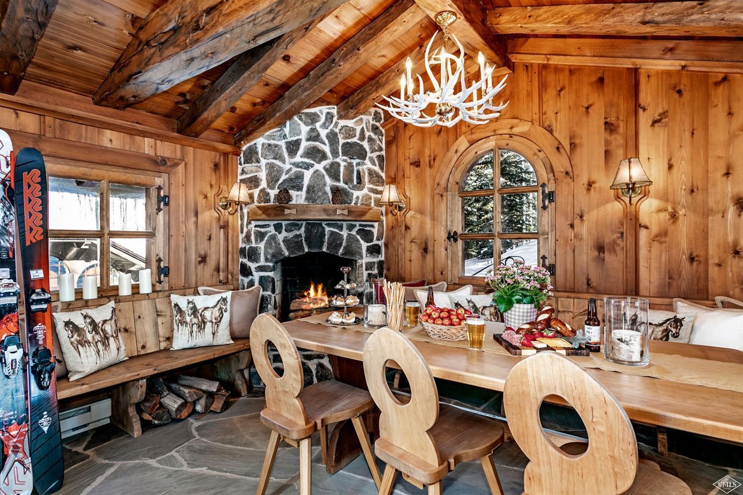 424 West Forest Road Vail, CO 81657 - Photo 13 of 17 a dinning table and chairs in a room