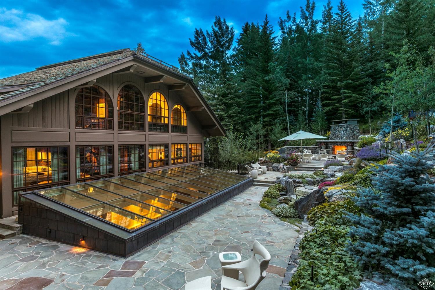 424 West Forest Road Vail, CO 81657 - Photo 16 of 17 a view of swimming pool with lounge chair and potted plants