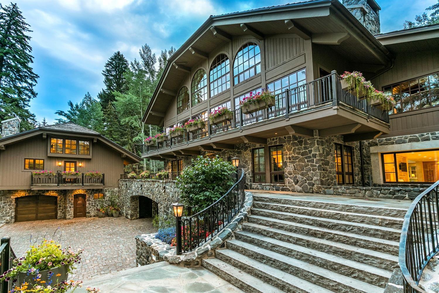 424 West Forest Road Vail, CO 81657 - Photo 2 of 17 a front view of a house with a garage