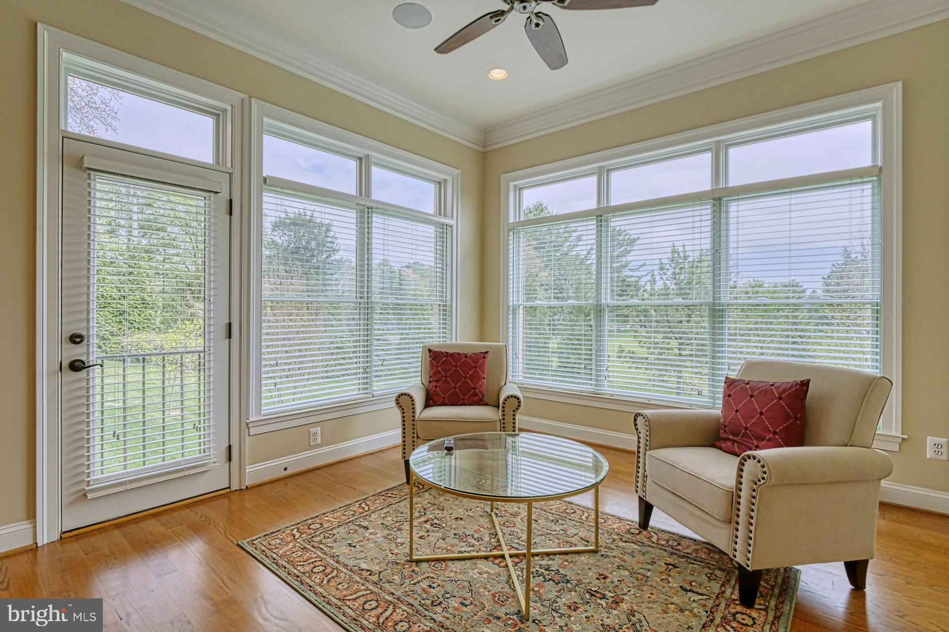 10405 Marbury Road Oakton, VA 22124 - Photo 16 of 72 a living room with furniture and a floor to ceiling window