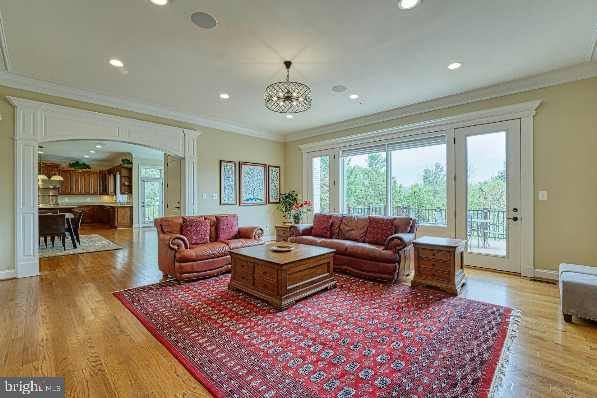 10405 Marbury Road Oakton, VA 22124 - Photo 20 of 72 Family Room with Wall of Windows and Doors to Deck
