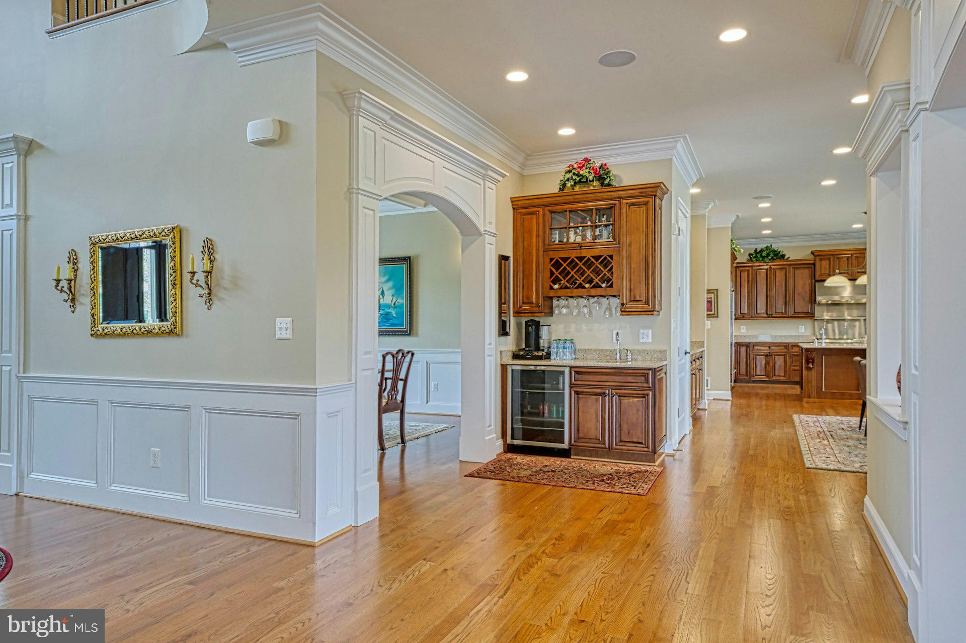 10405 Marbury Road Oakton, VA 22124 - Photo 28 of 72 a open kitchen with white cabinets and stainless steel appliances