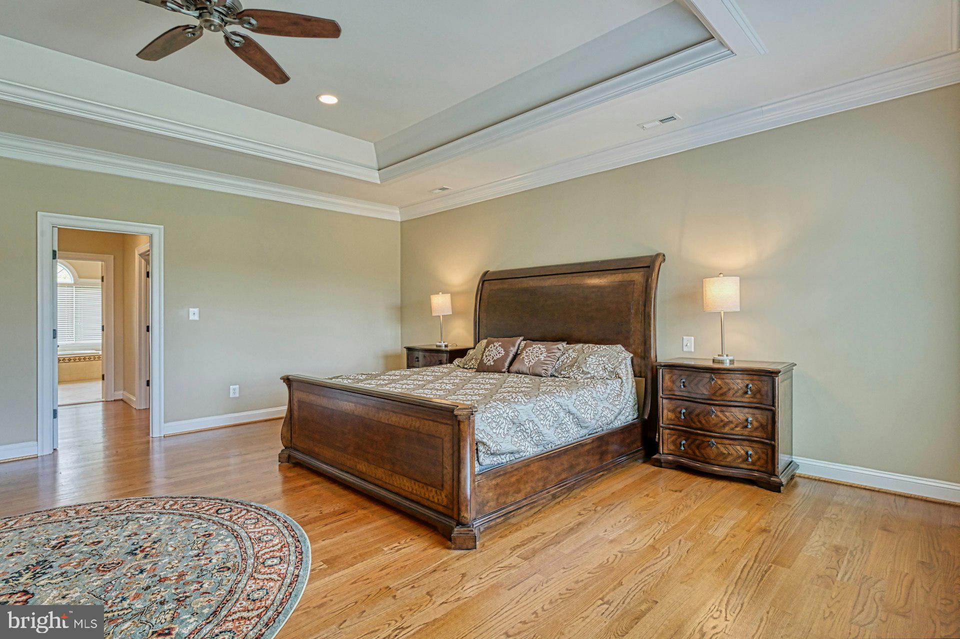 10405 Marbury Road Oakton, VA 22124 - Photo 31 of 72 a bedroom with a bed and cabinets