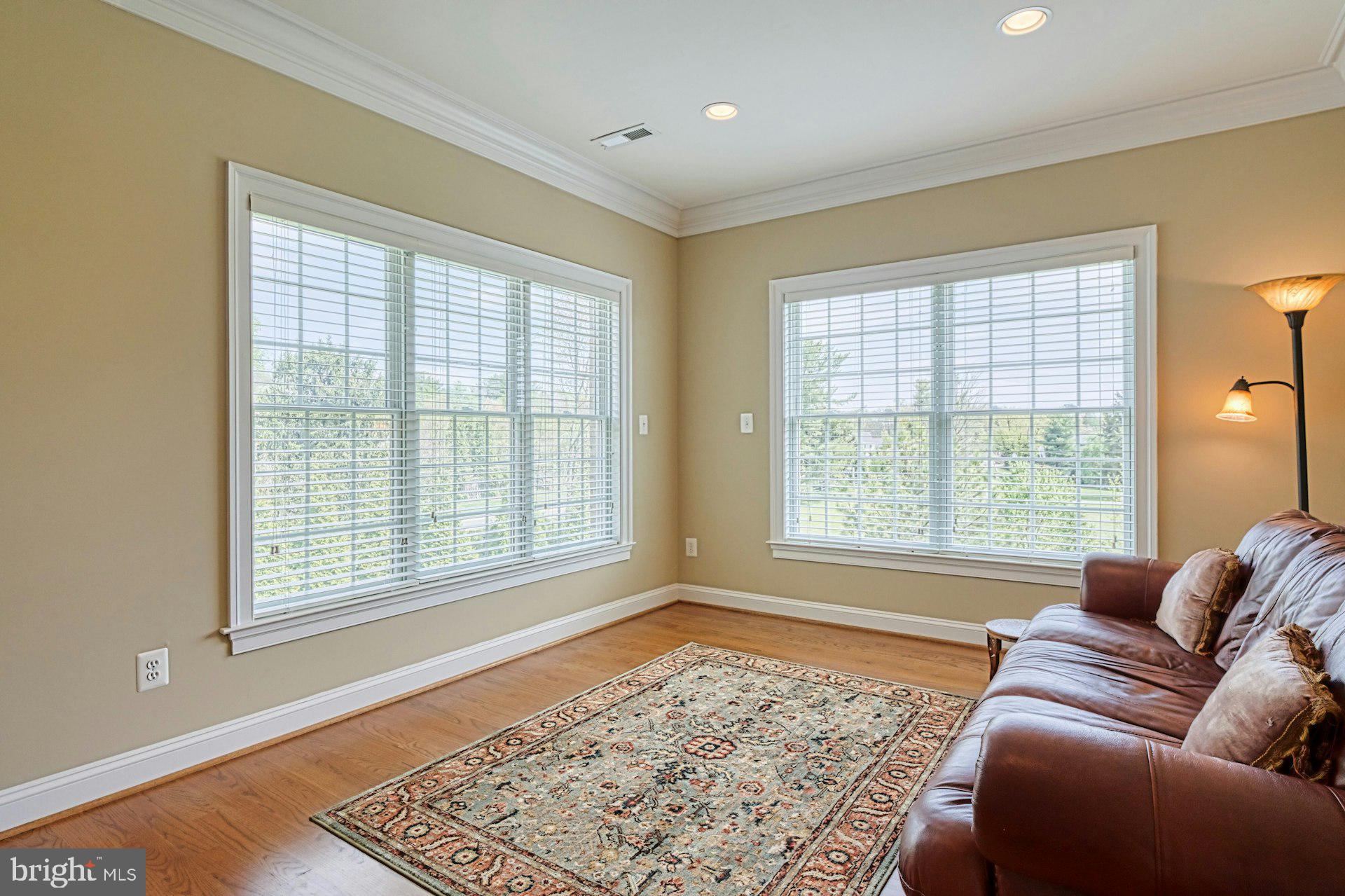 10405 Marbury Road Oakton, VA 22124 - Photo 34 of 72 a living room with furniture and a window