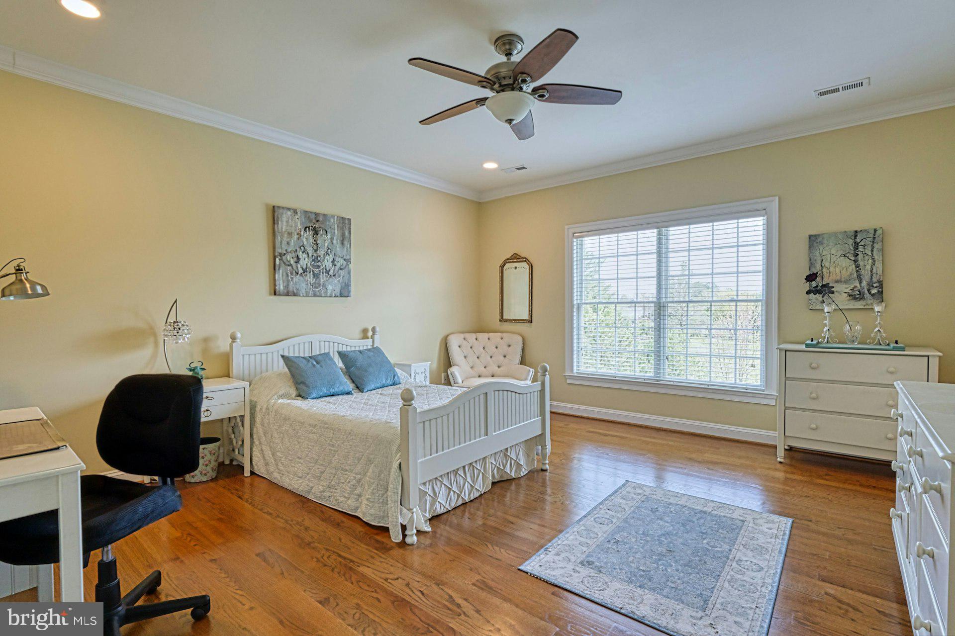 10405 Marbury Road Oakton, VA 22124 - Photo 38 of 72 a spacious bedroom with a bed and a window