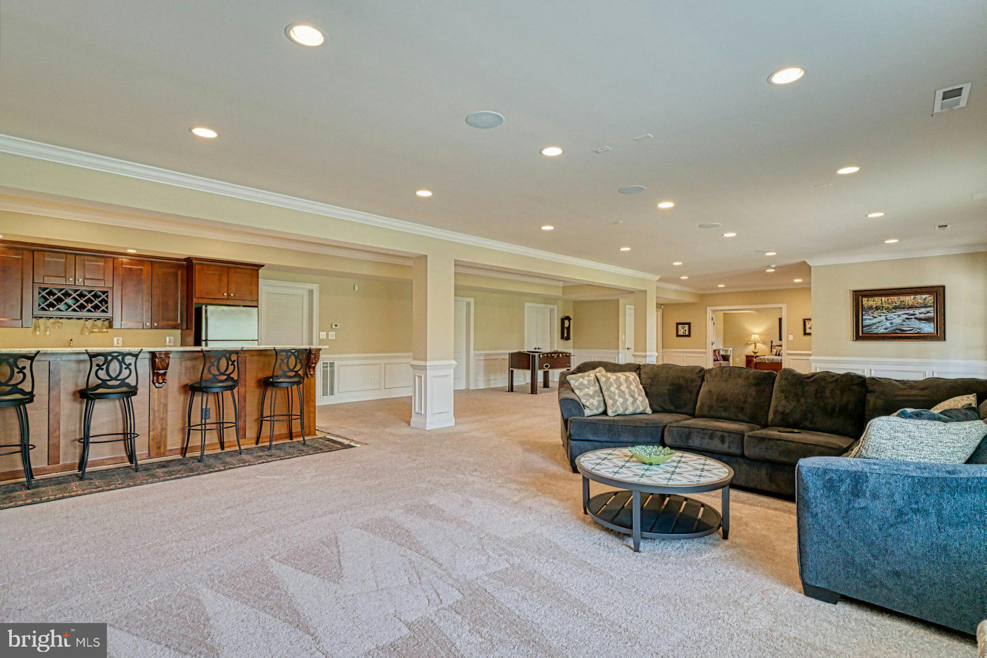 10405 Marbury Road Oakton, VA 22124 - Photo 51 of 72 a living room with furniture and a table