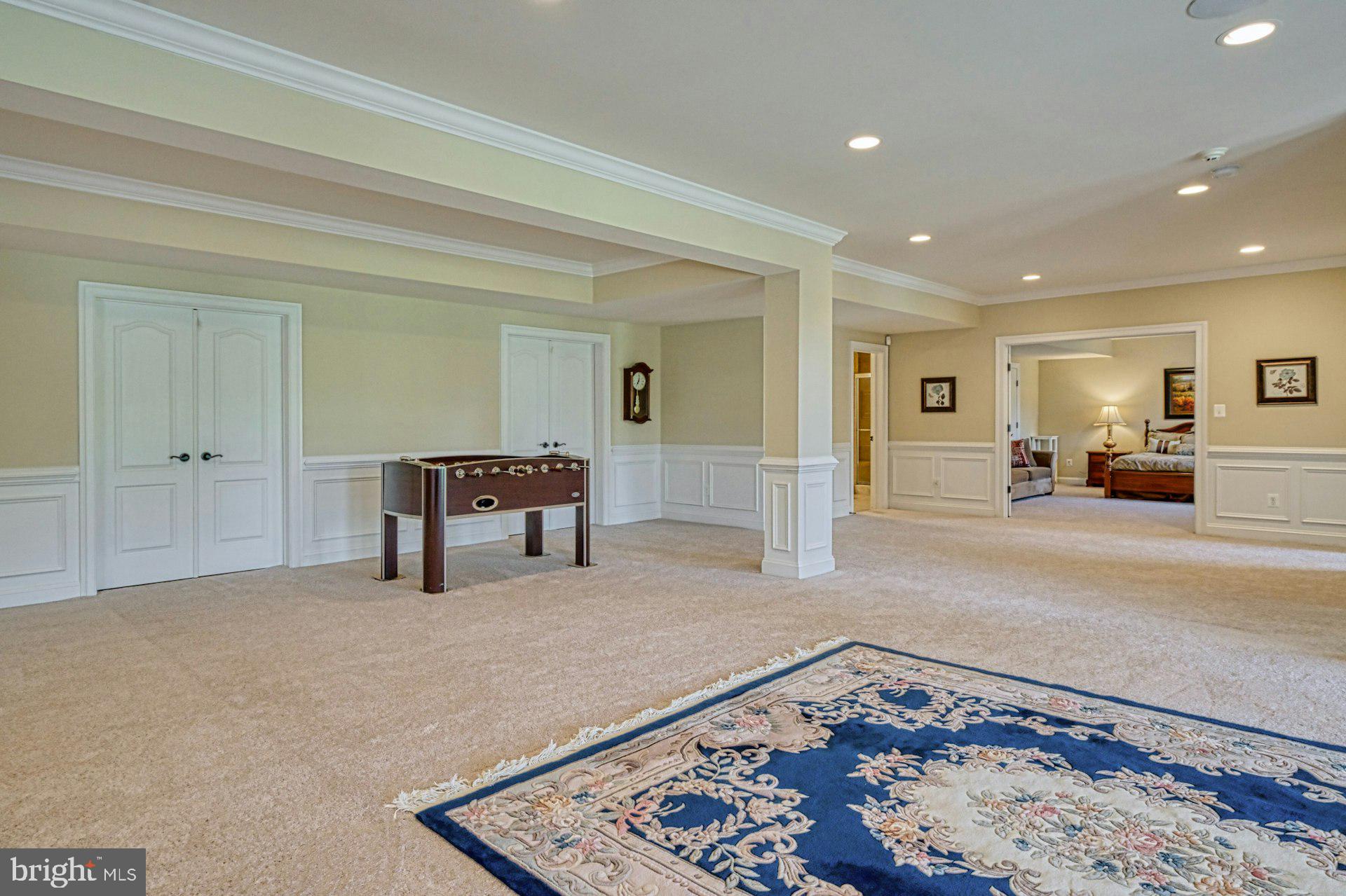 10405 Marbury Road Oakton, VA 22124 - Photo 54 of 72 a living room with furniture and a rug