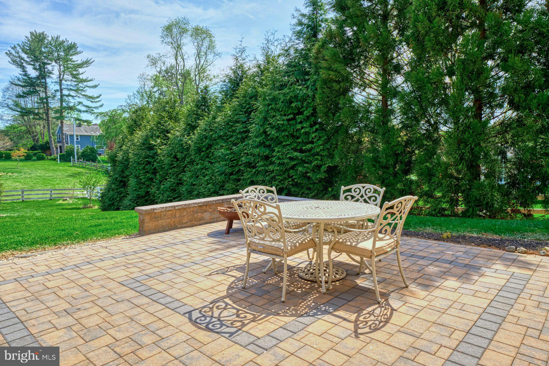 10405 Marbury Road Oakton, VA 22124 - Photo 61 of 72 a view of a patio with a table and chairs