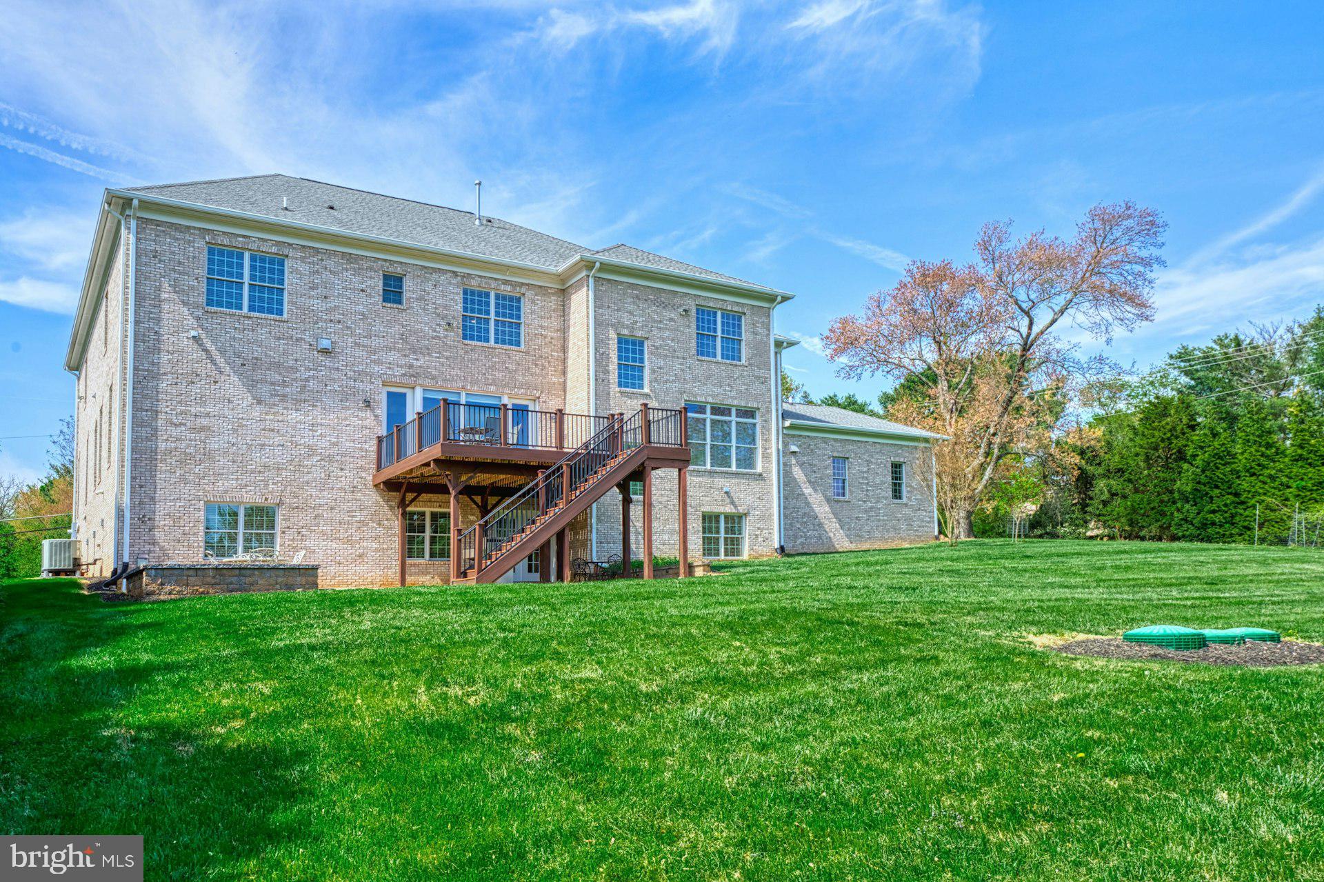 10405 Marbury Road Oakton, VA 22124 - Photo 62 of 72 a view of a house with a yard and sitting area