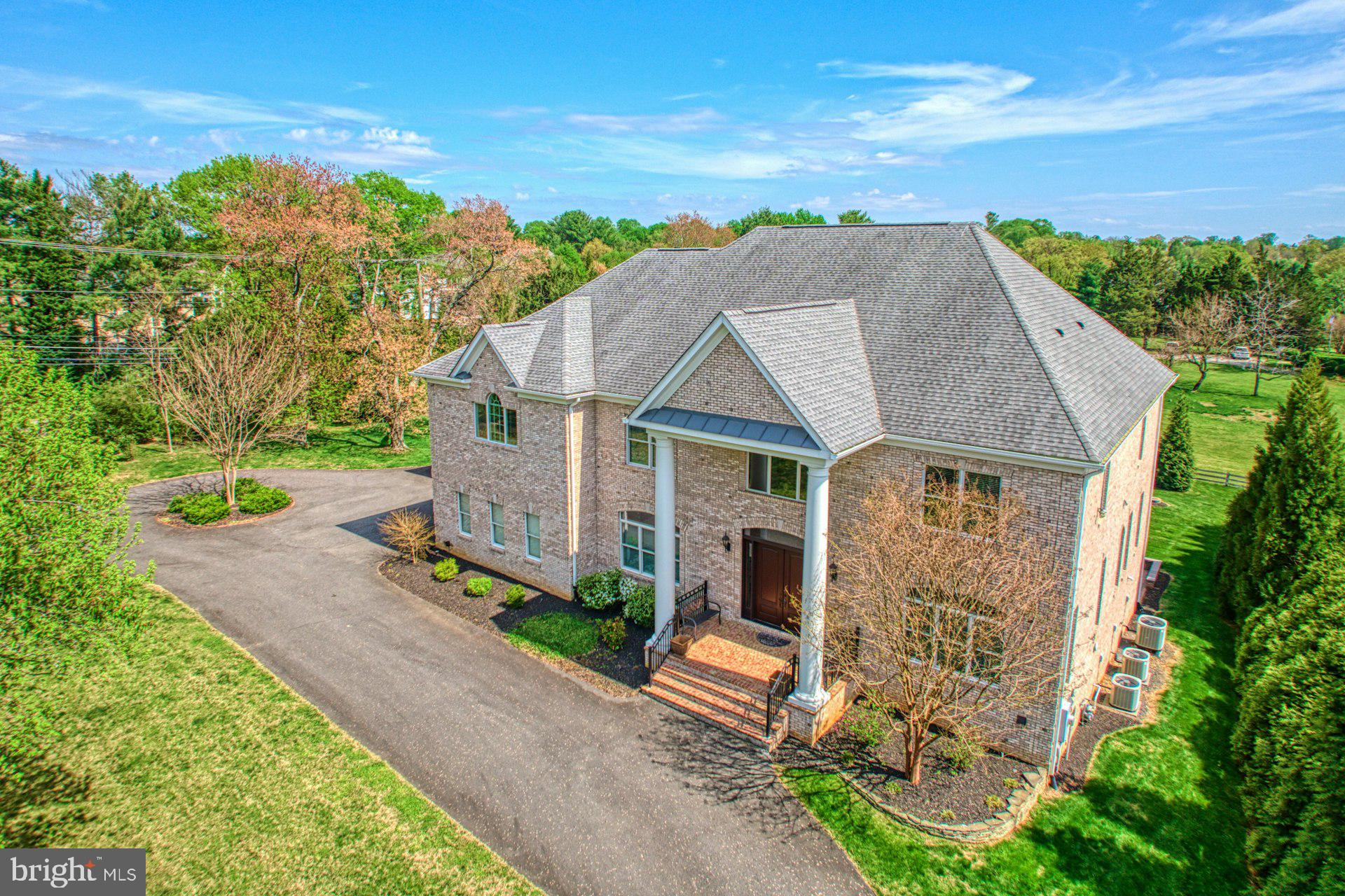 10405 Marbury Road Oakton, VA 22124 - Photo 67 of 72 an aerial view of a house with a yard