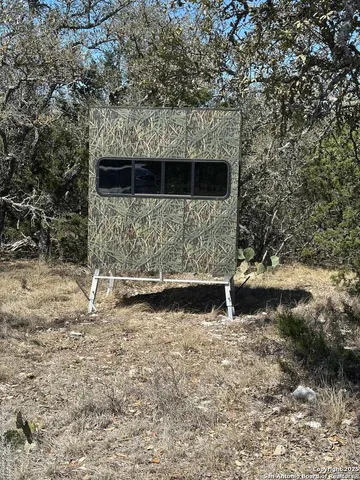 a view of a wooden fence