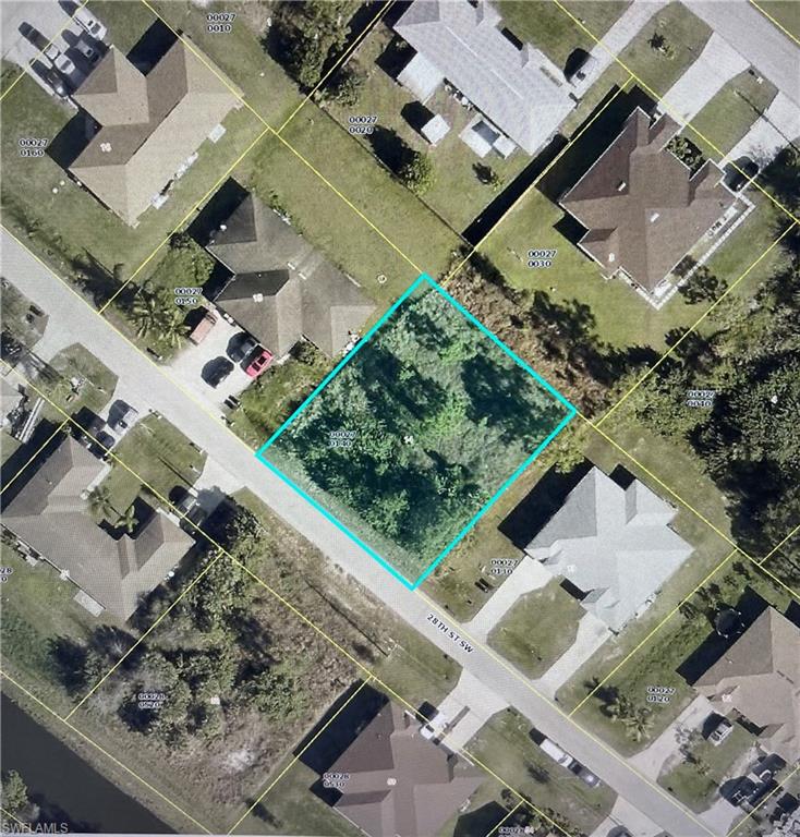 4824-4826 28th Street Southwest Lehigh Acres, FL 33973 - Photo 1 of 2 an aerial view of a residential houses with outdoor space