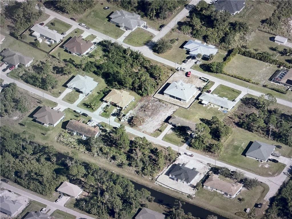 4824-4826 28th Street Southwest Lehigh Acres, FL 33973 - Photo 2 of 2 an aerial view of a city with lots of residential buildings
