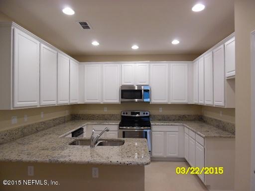 3095 Chestnut Ridge Way, Unit 21F Orange Park, FL 32065 - Photo 14 of 33 21F - Edgewood - Kitchen Pic 1 MLS.jpg