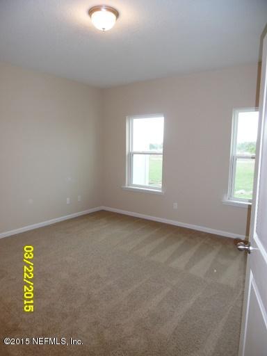 3095 Chestnut Ridge Way, Unit 21F Orange Park, FL 32065 - Photo 27 of 33 21F - Edgewood - Master Bdrm Pic 1 MLS.j