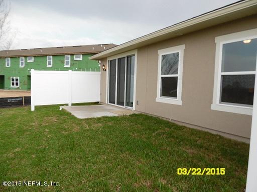 3095 Chestnut Ridge Way, Unit 21F Orange Park, FL 32065 - Photo 6 of 33 21F - Edgewood - Open Patio Pic 2 - MLS.