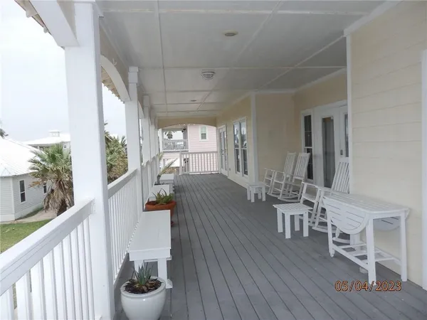 a view of a fence and trees