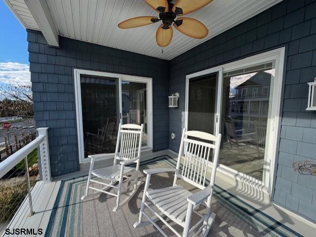 5 East Sumner Avenue Strathmere, NJ 08248 - Photo 22 of 31 a view of a patio with a table and chairs
