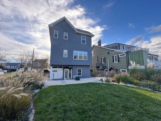 5 East Sumner Avenue Strathmere, NJ 08248 - Photo 27 of 31 a view of a brick building next to a big yard