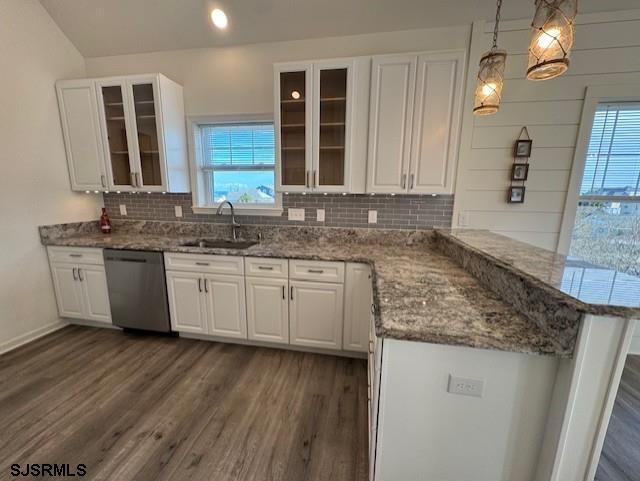 5 East Sumner Avenue Strathmere, NJ 08248 - Photo 5 of 31 a kitchen with stainless steel appliances granite countertop a sink stove and cabinets