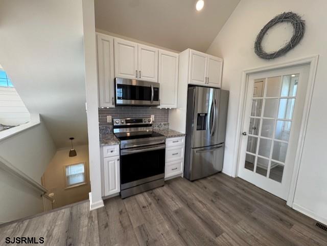 5 East Sumner Avenue Strathmere, NJ 08248 - Photo 6 of 31 a kitchen with a refrigerator stove and microwave