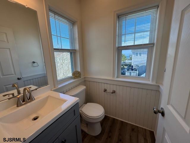 5 East Sumner Avenue Strathmere, NJ 08248 - Photo 10 of 31 a bathroom with a sink a toilet and window