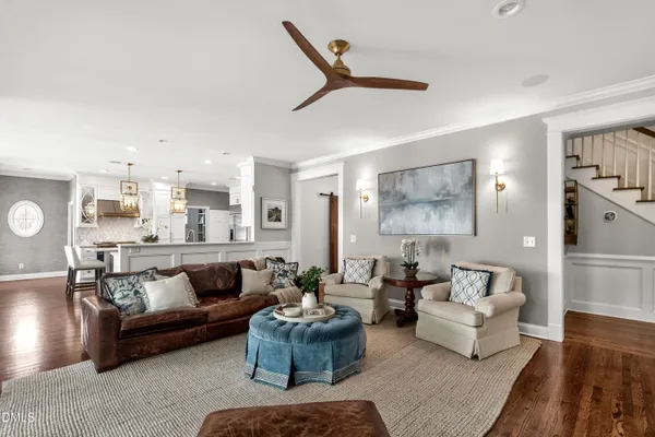 a kitchen with a sink stove and microwave