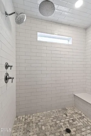 a view of a dining room with furniture and window