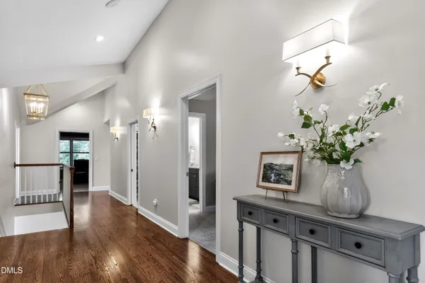 a living room with fireplace furniture and a fireplace