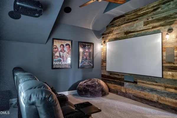 a front view of a house with a garden and plants