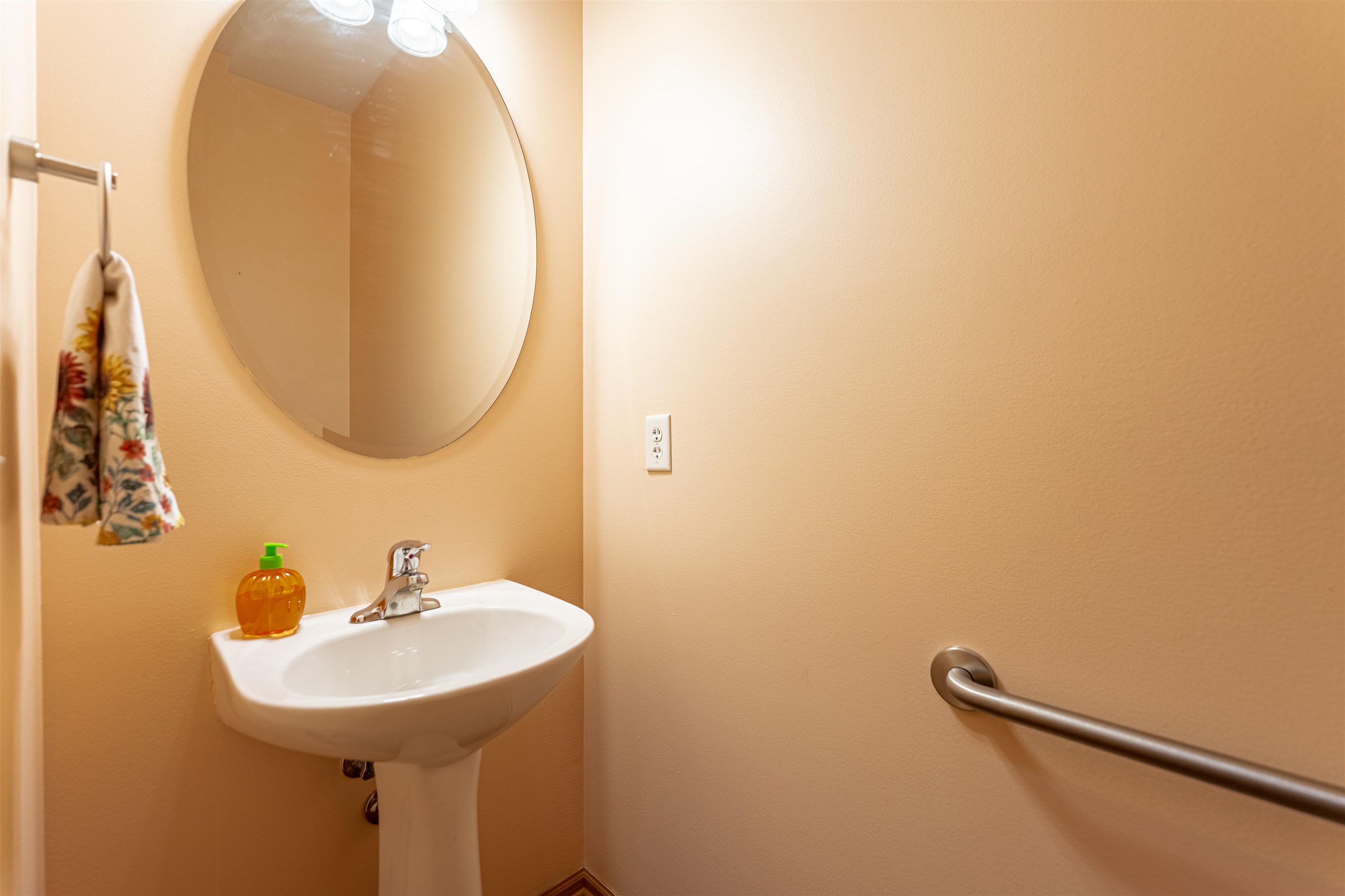 2155 Derby Lane Belvidere, IL 61008 - Photo 15 of 37 a bathroom with a sink and a mirror