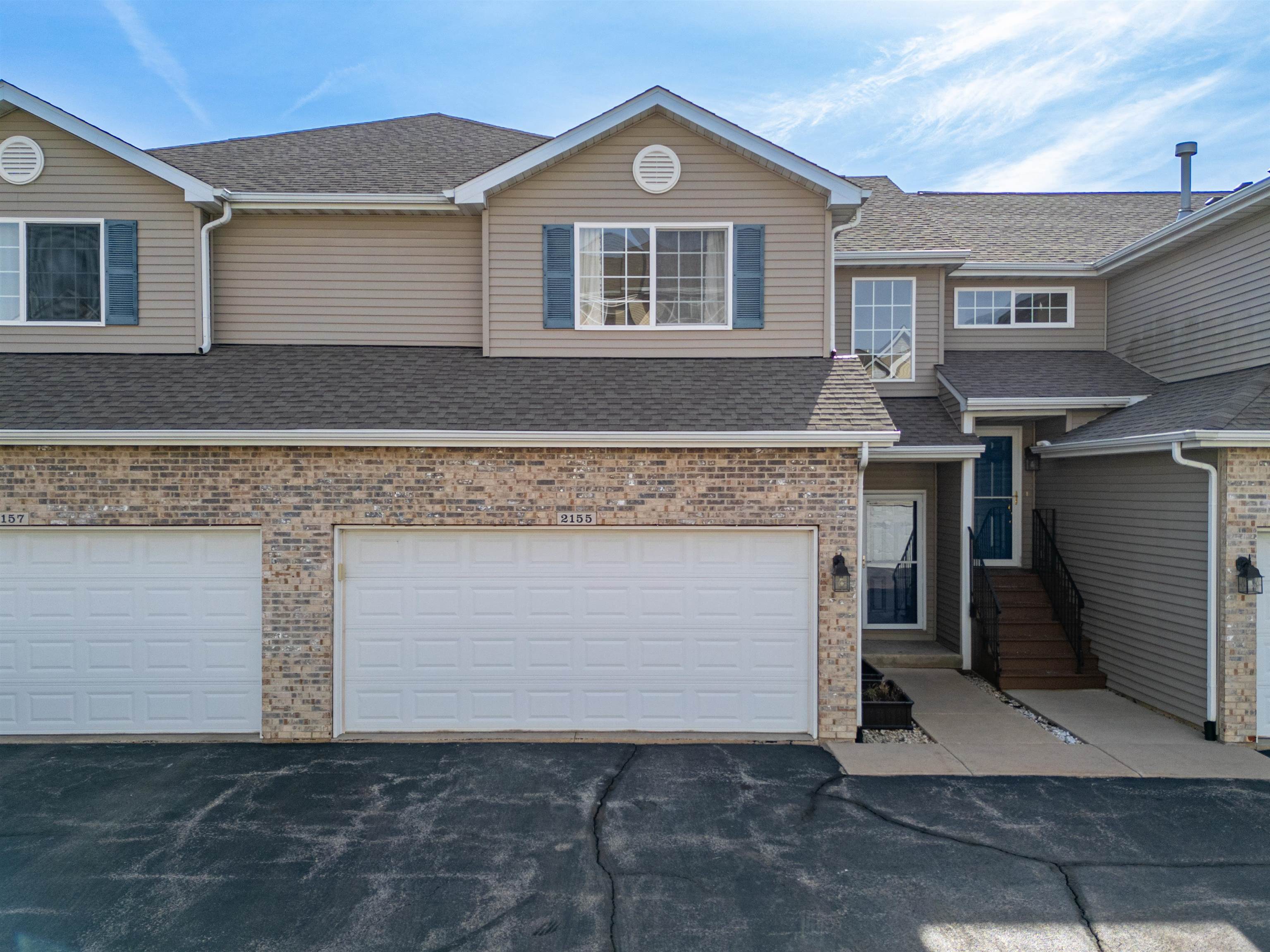 2155 Derby Lane Belvidere, IL 61008 - Photo 2 of 37 a front view of a house with a garage
