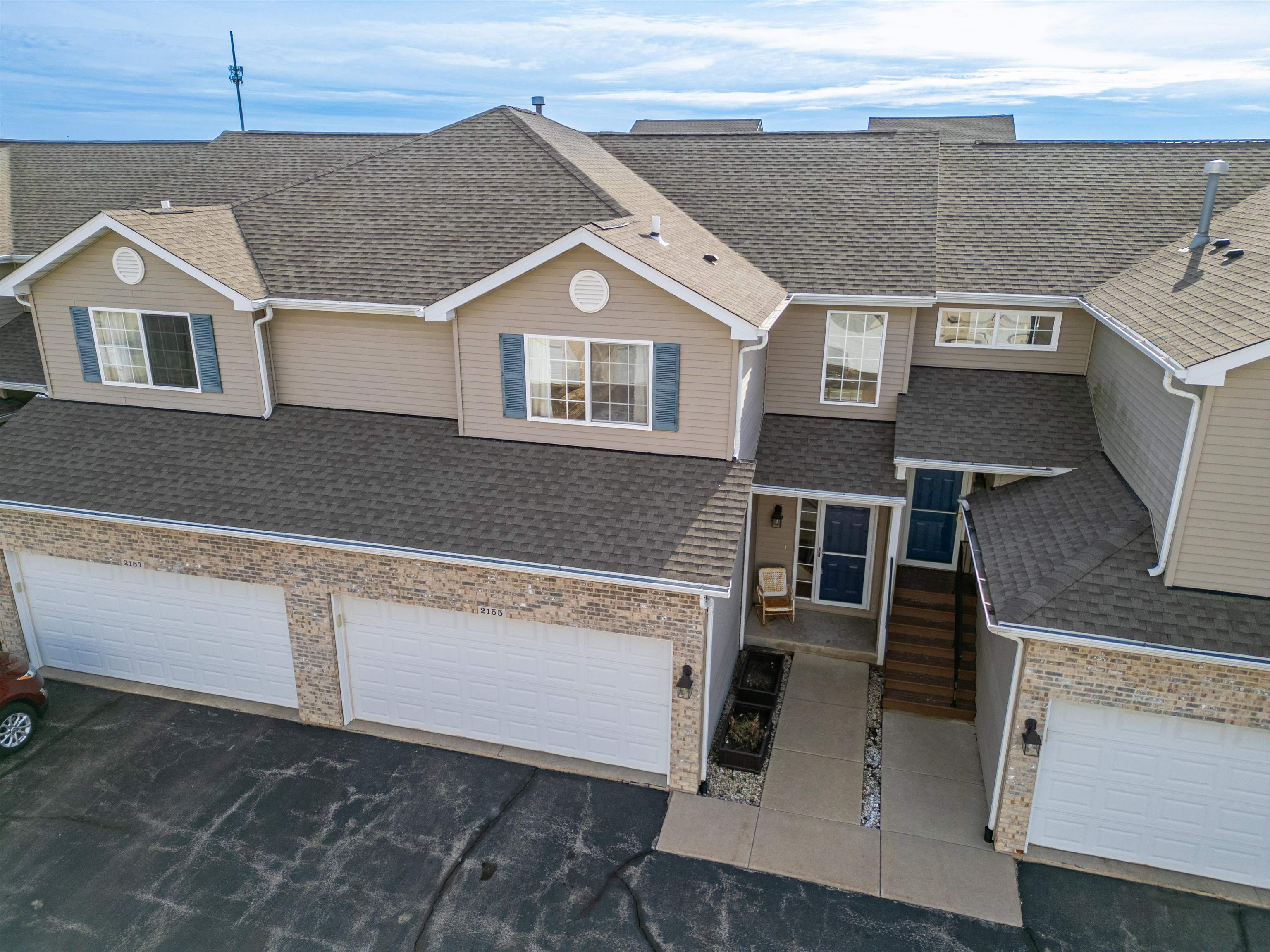 2155 Derby Lane Belvidere, IL 61008 - Photo 3 of 37 an aerial view of a house with wooden stairs