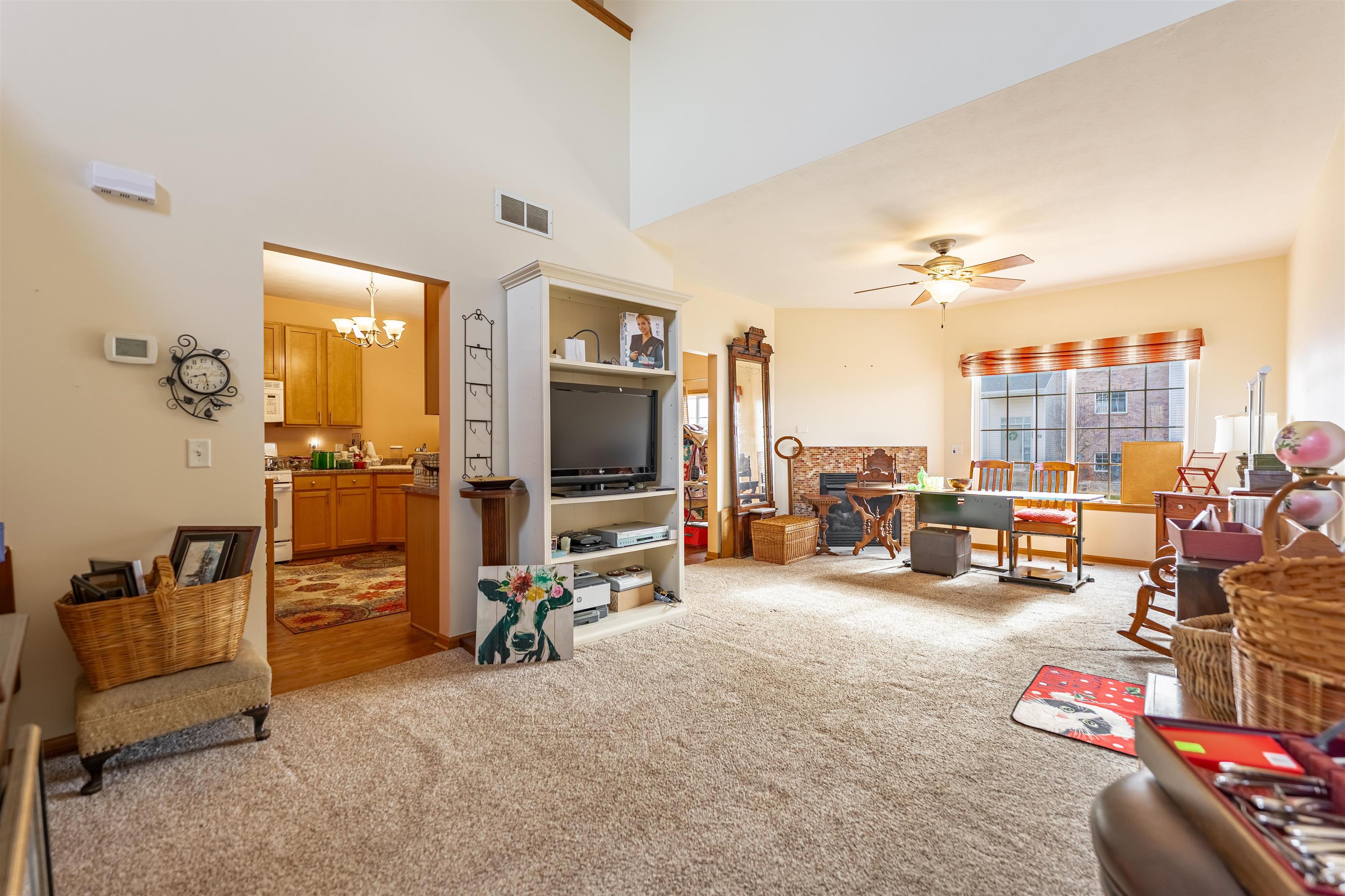 2155 Derby Lane Belvidere, IL 61008 - Photo 7 of 37 a view of a livingroom with furniture and a flat screen tv